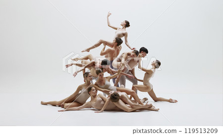 Ballet dancers in dynamic artistic pose. Young men and women performing with beauty and elegance. 119513209