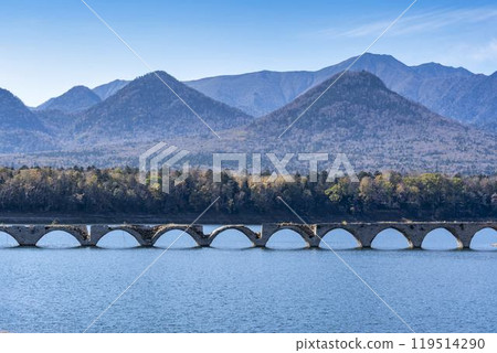 Taushubetsu River Bridge on the former Shihoro Line of the Japanese National Railways on a clear autumn day in Kamishihoro, Hokkaido 119514290