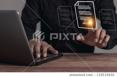 Young man with laptop hand touching to sign a business contract online, Electronic signature Young man with laptop hand touching to sign a business contract online, Electronic signature 119514838