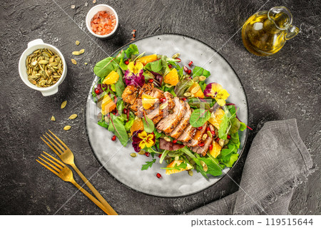 Duck salad with grilled breast and vegetables on plate, Thanksgiving dinner top view 119515644