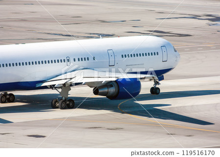 Taxiing passenger airplane on the airport 119516170
