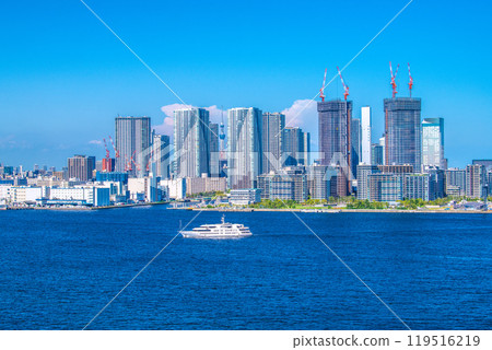 Tokyo cityscape in Japan. The Harumi Passenger Terminal has been closed for a long time. View of tower apartments in Harumi and other areas. Tokyo cityscape in Japan. The Harumi Passenger Terminal has been closed for a long time. View of tower apartments in Harumi and other areas. 119516219