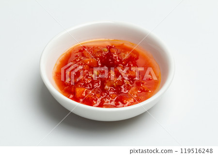 Red sauce from tomatoes and peppers in the bowl. 119516248