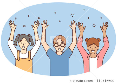Smiling children raise hands playing together 119516600