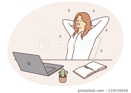 Smiling woman sitting at a table with a laptop 119516648
