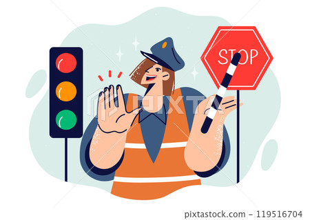 Woman traffic controller shows stop gesture, standing near traffic light for cars. 119516704