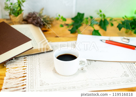 Coffee and books on the table Coffee and books on the table 119516818