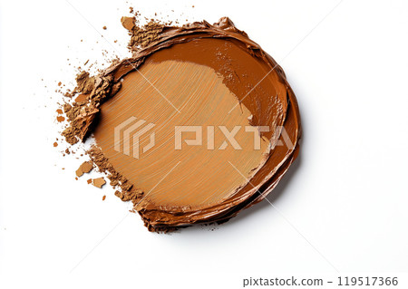 Rich brown cream displayed on a white surface reflects artistic makeup application techniques for 119517366