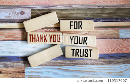 Thank you for your trust. Conceptual words Thank you for your trust on wooden blocks Thank you for your trust. Conceptual words Thank you for your trust on wooden blocks 119517607
