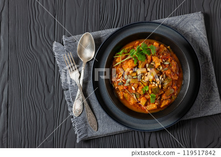 healthy zucchini stew in tomato sauce, top view 119517842