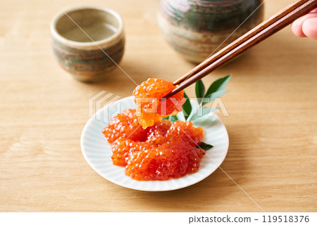 Herring roe marinated in soy sauce served on a small plate 119518376
