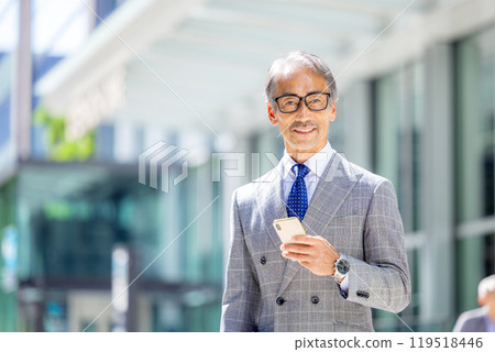Street corner smartphone senior man 119518446