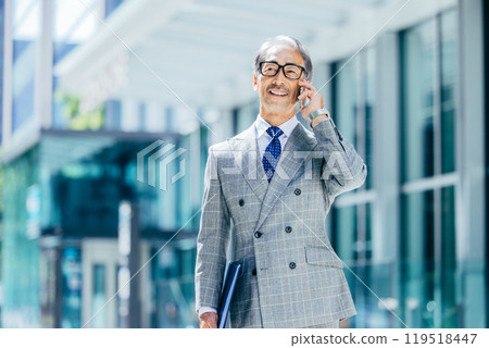 Street corner smartphone senior man 119518447