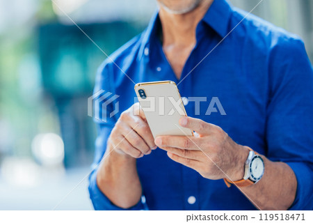 senior man with smartphone senior man with smartphone 119518471