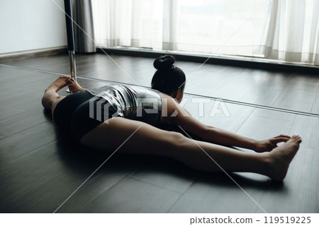 Practicing Yoga with Grace in Spacious Home Studio Practicing Yoga with Grace in Spacious Home Studio 119519225