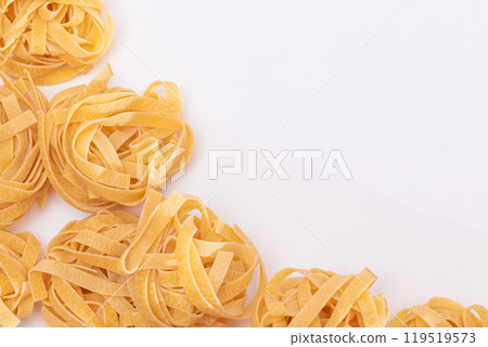 Classic Italian Raw Egg Fettuccine on White Background 119519573
