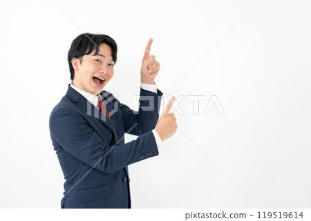Businessman, male in his 20s, pointing Businessman, male in his 20s, pointing 119519614