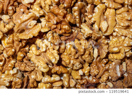 Scattered Shelled Walnuts. Background from Walnut Scattered Shelled Walnuts. Background from Walnut 119519641