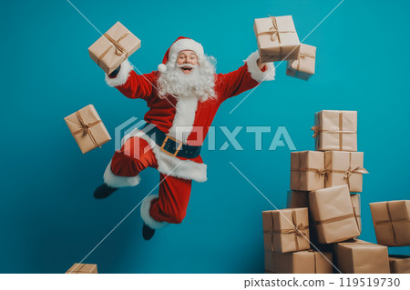 Cheerful Santa Claus jumping with presents against a vibrant blue background during the holiday 119519730