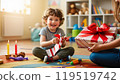 Child receiving a birthday present 119519742