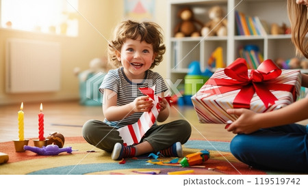 Child receiving a birthday present 119519742