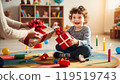 Child receiving a birthday present 119519743