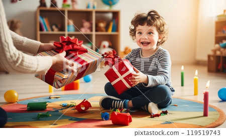 Child receiving a birthday present 119519743