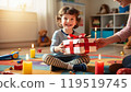 Child receiving a birthday present 119519745