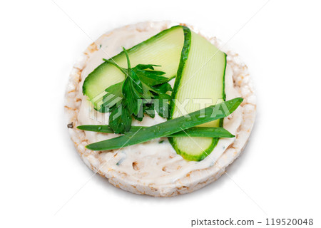 Vegan Rice Cake Sandwich with Fresh Cucumber and Greens - Isolated on White Vegan Rice Cake Sandwich with Fresh Cucumber and Greens - Isolated on White 119520048