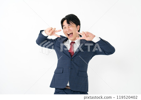 Businessman, male in his 20s, peace sign Businessman, male in his 20s, peace sign 119520402