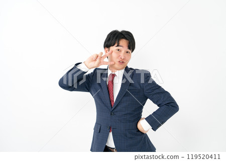 Businessman, male in his 20s, peace sign Businessman, male in his 20s, peace sign 119520411
