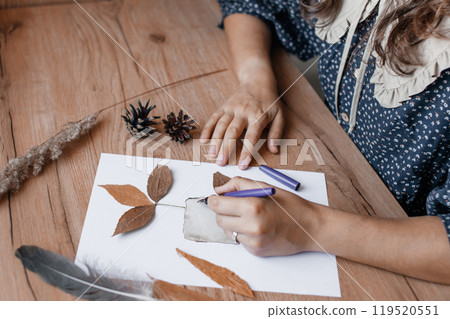Autumn Crafts with Leaves and Natural Elements on Wooden Table 119520551