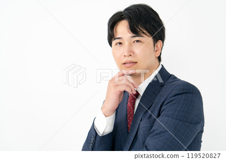 Businessman, male in his 20s, plotting Businessman, male in his 20s, plotting 119520827