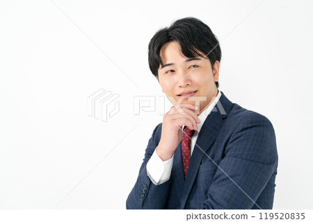 Businessman, male in his 20s, plotting Businessman, male in his 20s, plotting 119520835