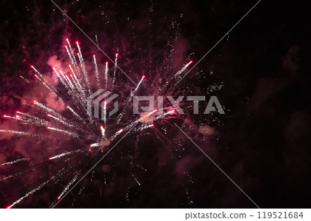 Festive background explosion of fireworks and red smoke. Festive background explosion of fireworks and red smoke. 119521684