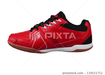Red sneakers with black laces and white stripes on a white background. 119521712