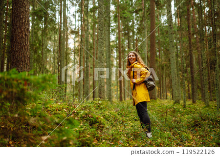 Young woman explores new, fantastic places around world, surrounded by nature relax Active Lifestyle 119522126