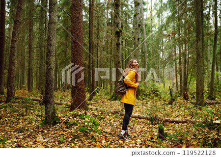 Young woman explores new, fantastic places around world, surrounded by nature relax Active Lifestyle 119522128