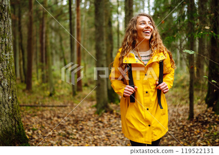 Young woman explores new, fantastic places around world, surrounded by nature relax Active Lifestyle Young woman explores new, fantastic places around world, surrounded by nature relax Active Lifestyle 119522131