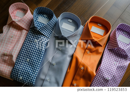 Elegant collection of men's formal dress shirts showcased in a flat lay arrangement 119523853