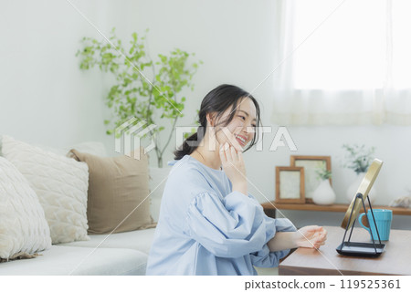 A young woman concerned about her skin condition 119525361