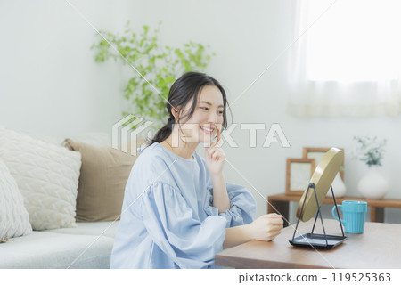 A young woman concerned about her skin condition 119525363