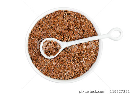 flaxseed in ceramic bowl isolated on white background. Top view. Flat lay 119527231
