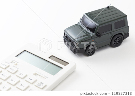 Toy car and calculator on white background 119527318