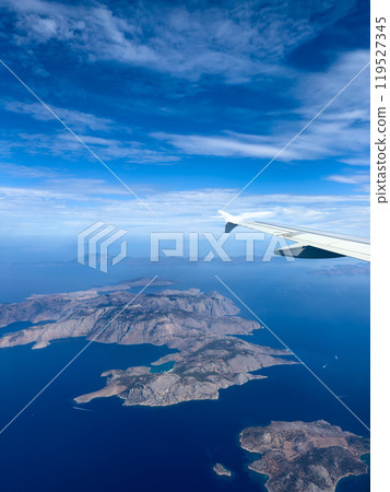 Aerial View of Picturesque Islands in Blue Waters Taken During a Flight Over the Mediterranean Sea on a Clear Day 119527345