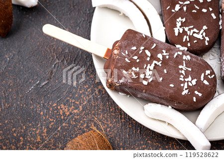 Coconut popsicles in chocolate glaze Coconut popsicles in chocolate glaze 119528622