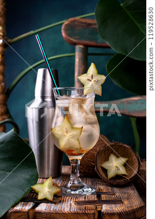Tropical exotic cocktail with carambola 119528630