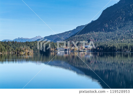 Autumn colors in fall at lake Eibsee, Garmisch-Partenkirchen, Bavarian alps, Germany Autumn colors in fall at lake Eibsee, Garmisch-Partenkirchen, Bavarian alps, Germany 119528953