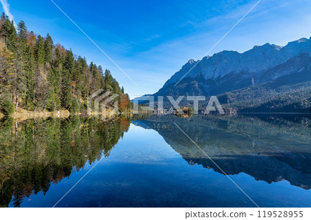 Autumn colors in fall at lake Eibsee, Garmisch-Partenkirchen, Bavarian alps, Germany 119528955