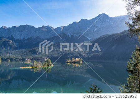 Autumn colors in fall at lake Eibsee, Garmisch-Partenkirchen, Bavarian alps, Germany Autumn colors in fall at lake Eibsee, Garmisch-Partenkirchen, Bavarian alps, Germany 119528958